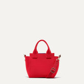 PLP |The Mini Handbag in Candy Apple shown from the front.