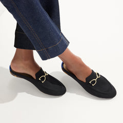 hover | Model wearing The Double Bit Loafer Mule in Black. 
