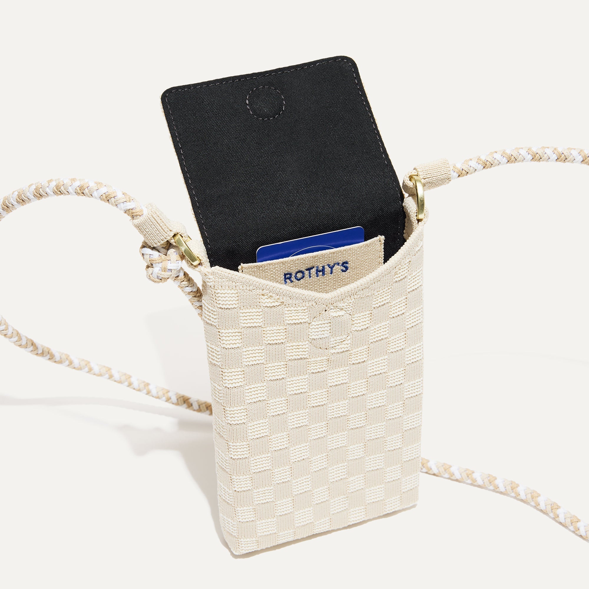 Close up of The Phone Crossbody interior slip pocket.