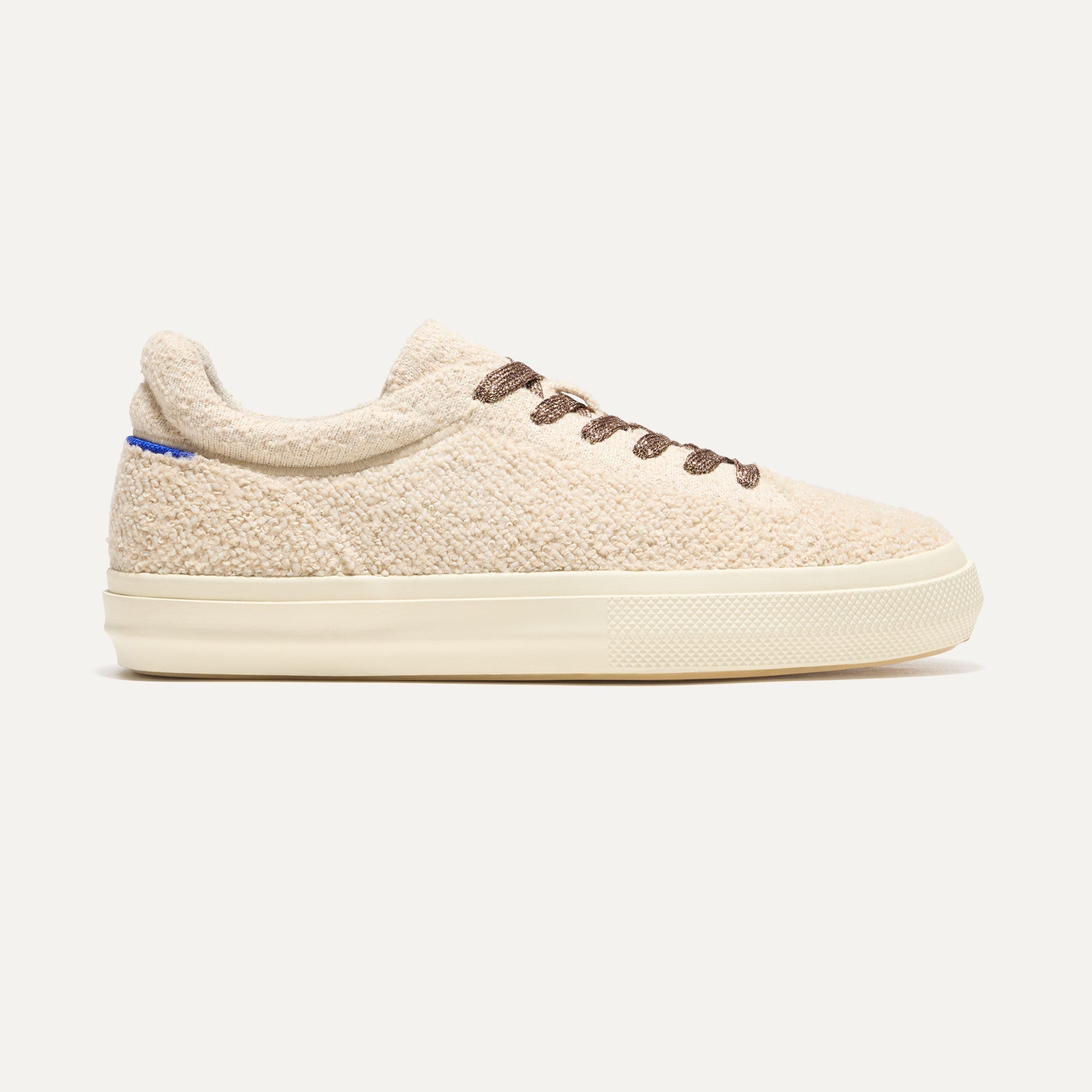 The RS02 Sneaker Honeybun Bouclé shown from the side. 
