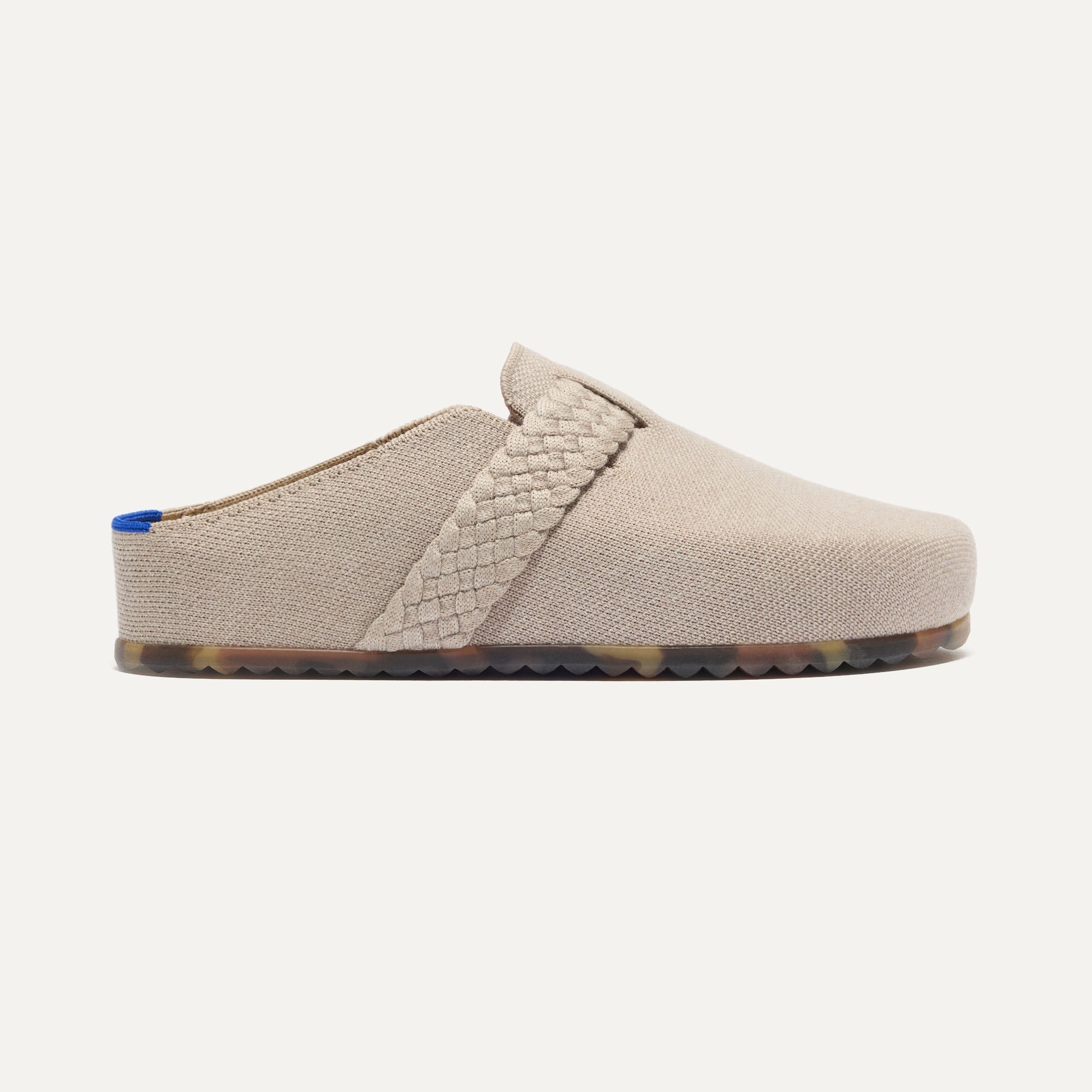 side | The Braid Clog in Dove shown from the side.