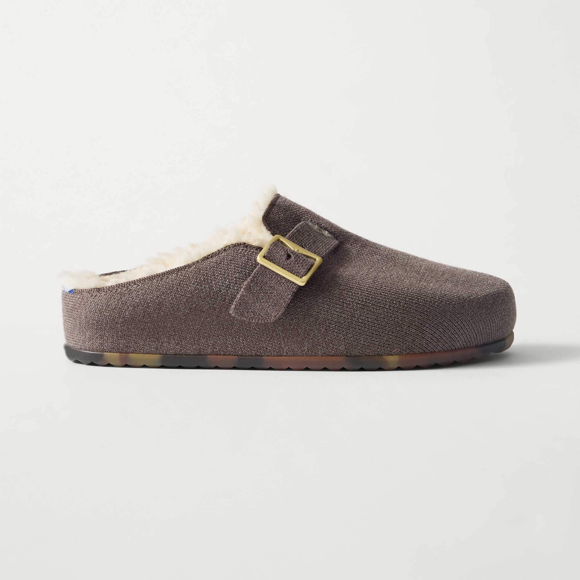 side | The Teddy Buckle Clog in Porcini shown from the side.