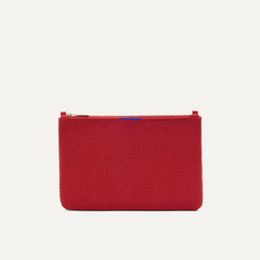 PLP |The Convertible Clutch in Scarlet Open-Knit, shown from the front.
