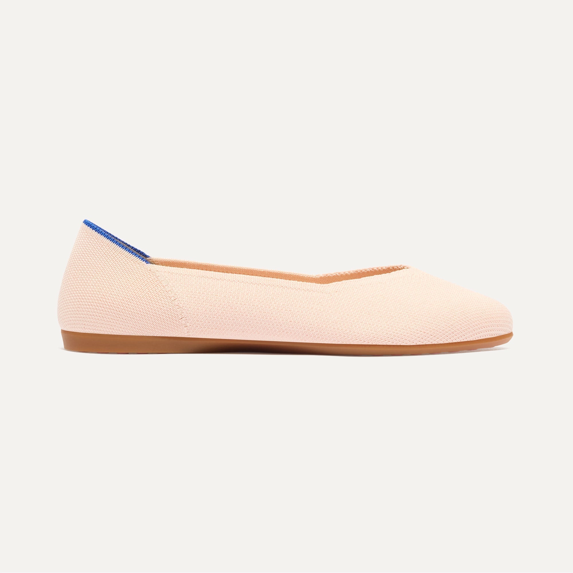 side | The Daily Flat in Bubbly Pink shown from the side. 