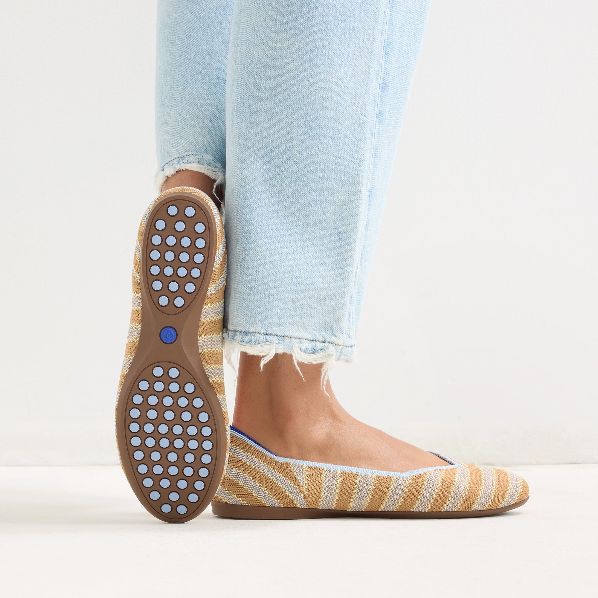 hover | Model wearing The Daily Flat in Terra Stripe. 
