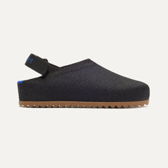 side | The Kids Clog in Black shown from the side. 