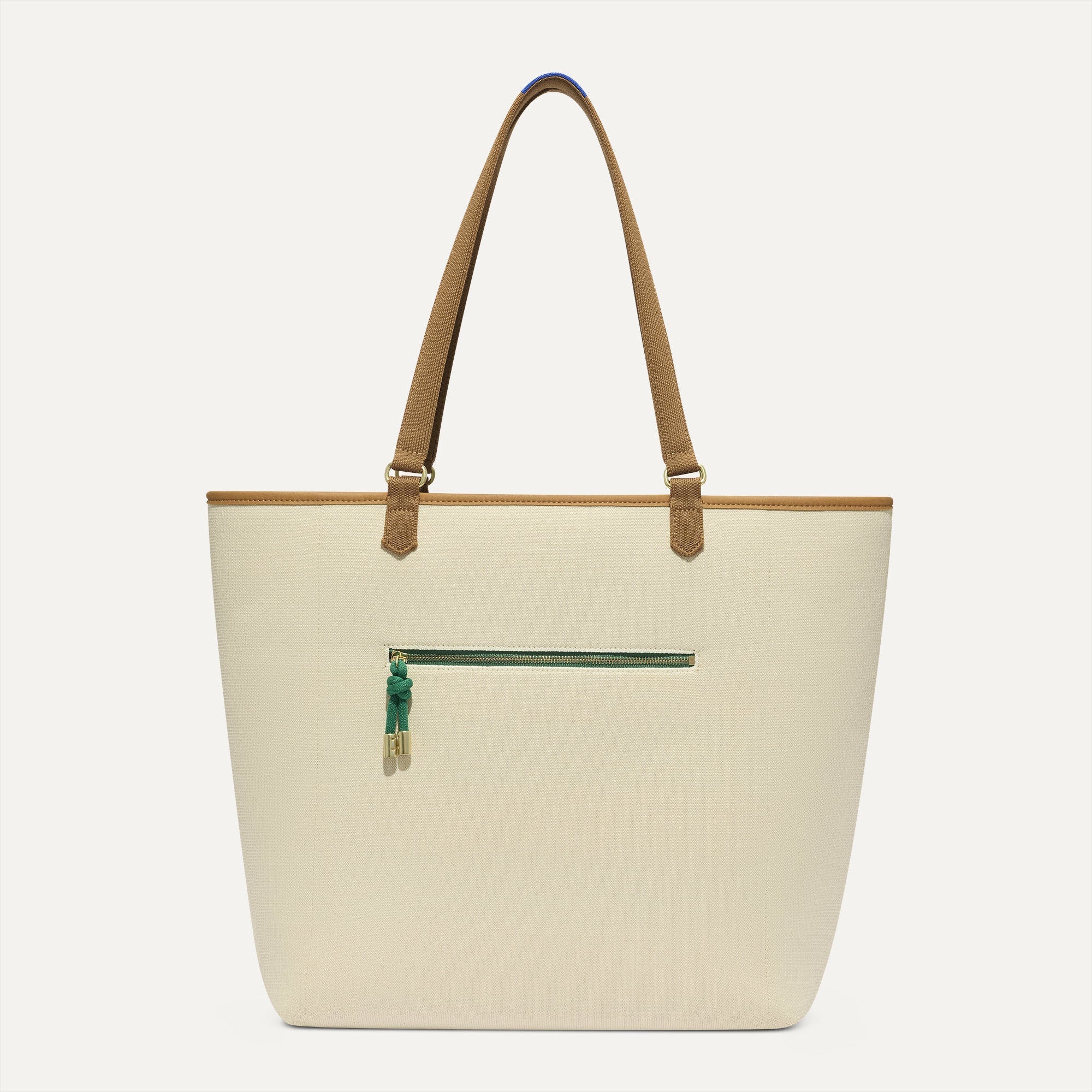 Overlay::Two looks in one! Just flip it inside out to wear the cream side. | Alt::The Two-Way Tote in Ivy shown from reversible side. 