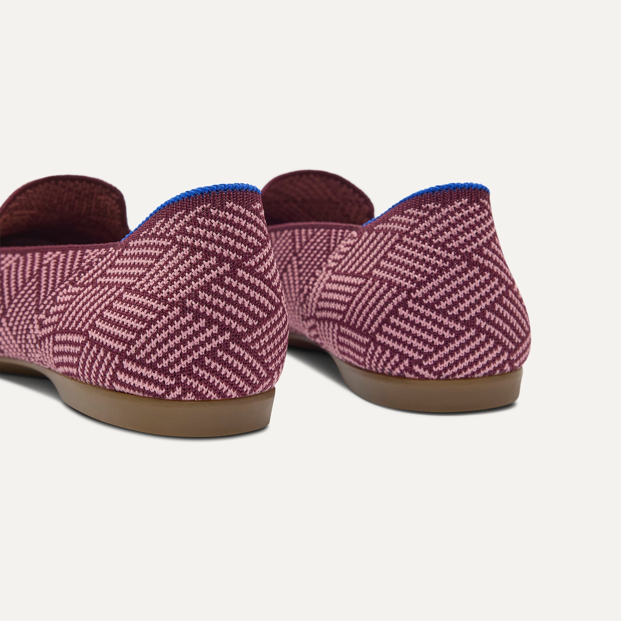 Close up of the heel of The Daily Loafer in Fig Zig Zag, with Rothy's signature blue halo. 