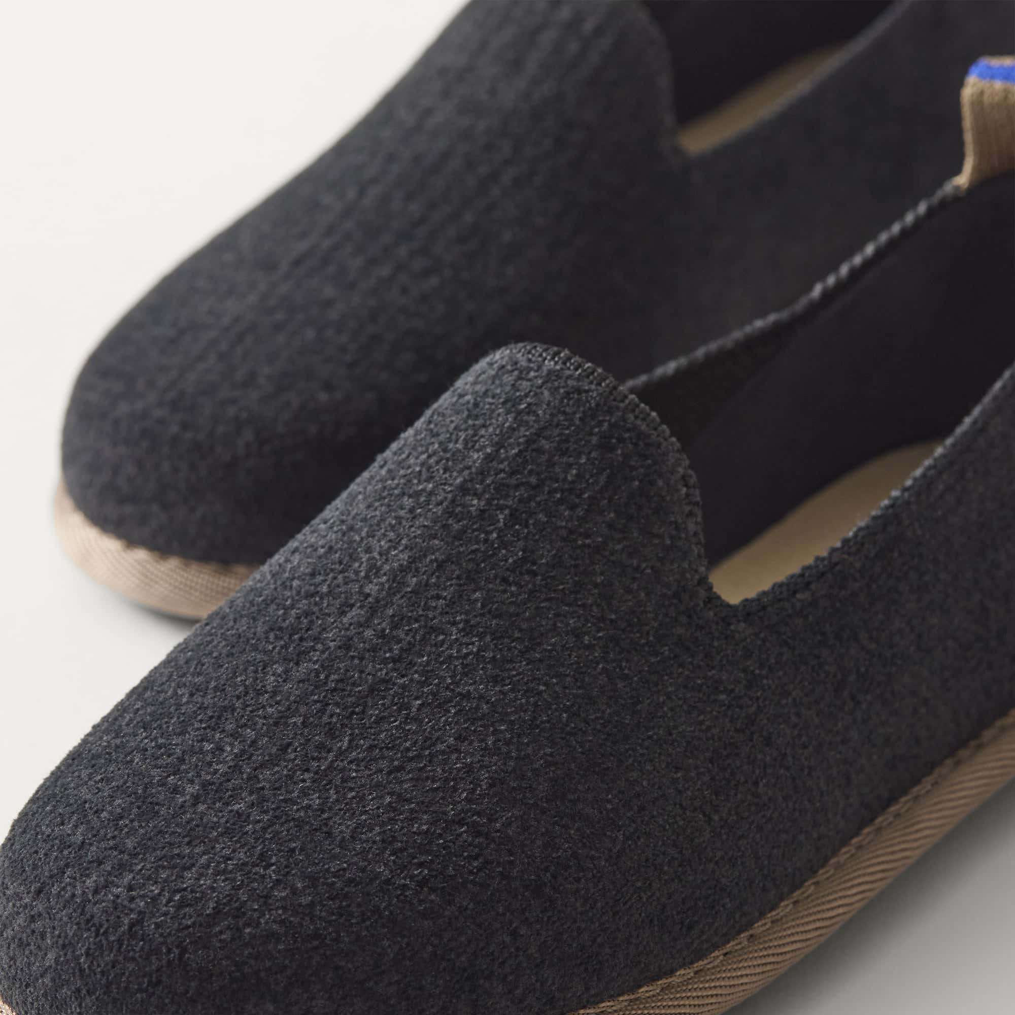 The Mini Loafer in ReVelvet™ Black view with detailing of the front of the shoe.