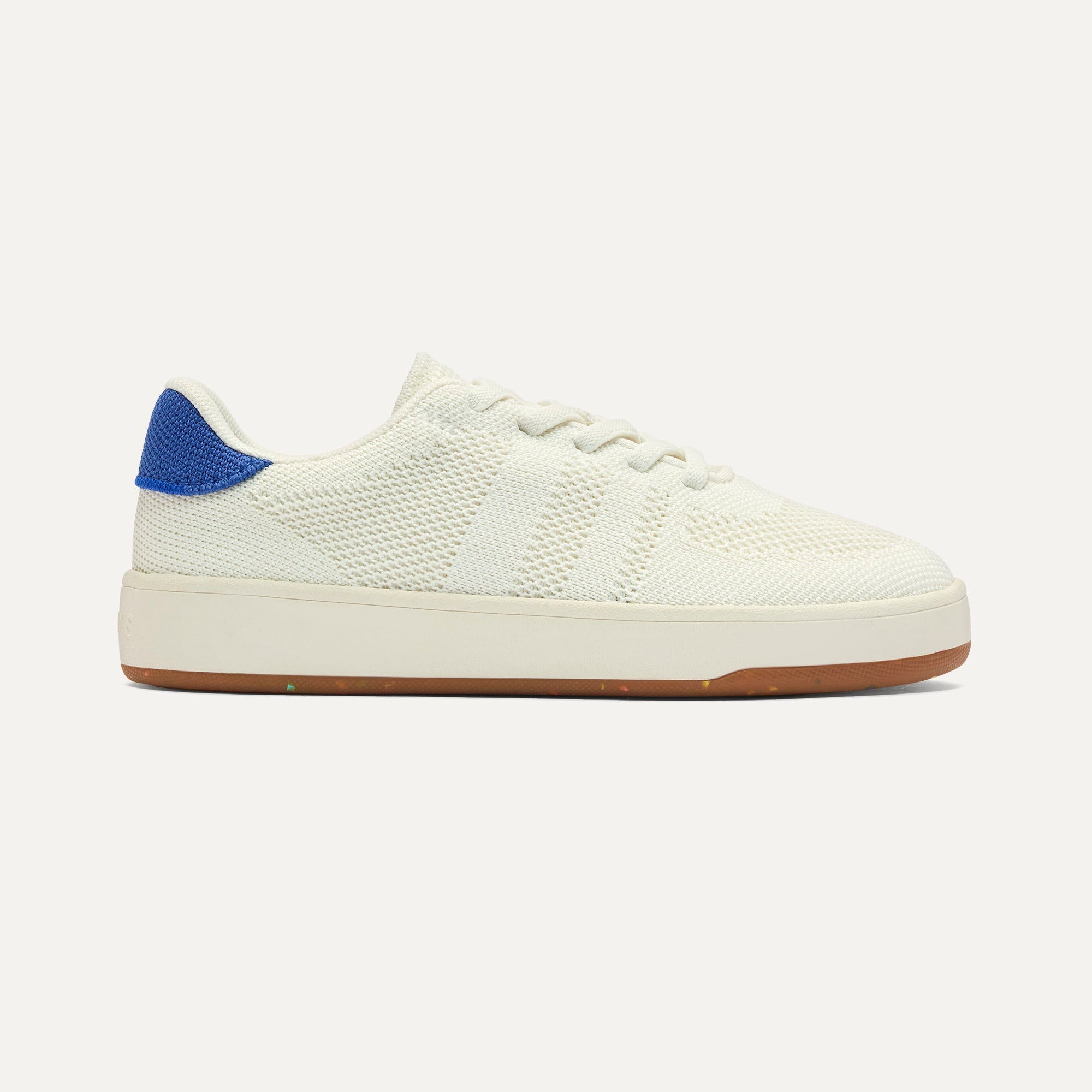 side | The Kids Stretch Sneaker in Turbo shown from the side. 
