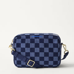 PDP | The Crossbody Camera Bag in  ReVelvet™ Blue Ink, shown from the front. 